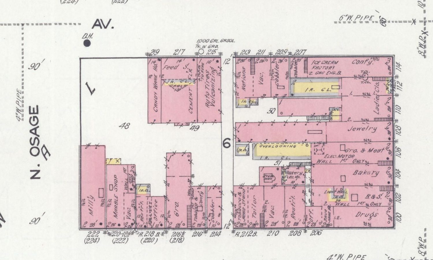 1916 Sanborn fire-insurance map of the 200 block of West Lexington Avenue, showing the rebuilt two-story brick Street Building with a drug store, restaurant, and tailor.