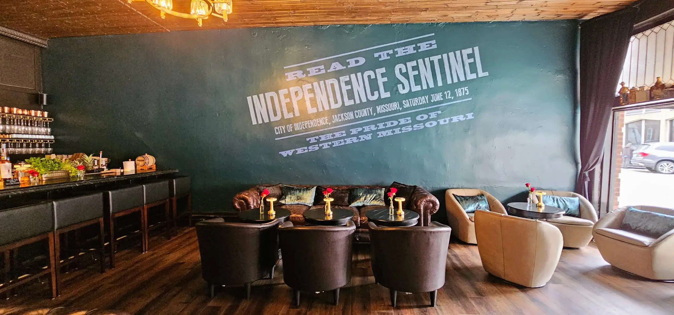 Leather seating and low lighting in The Sentinel Room cocktail lounge